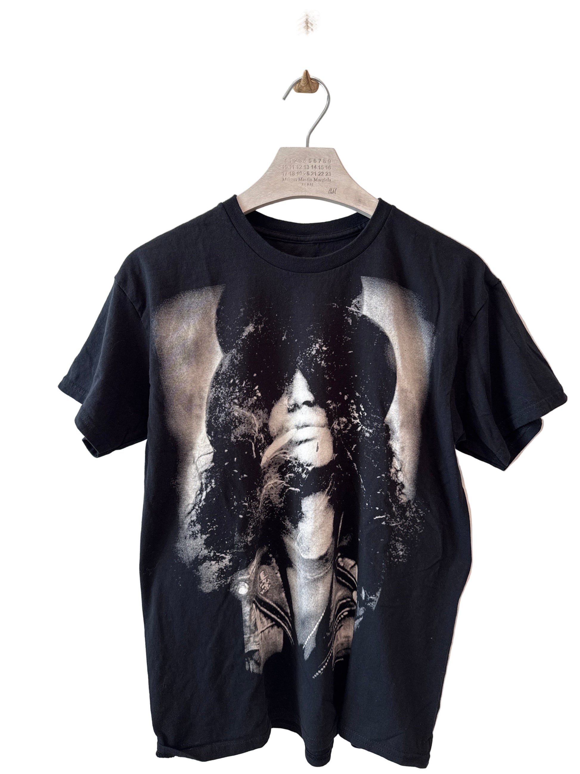 Black t-shirt with a graphic design on a white background